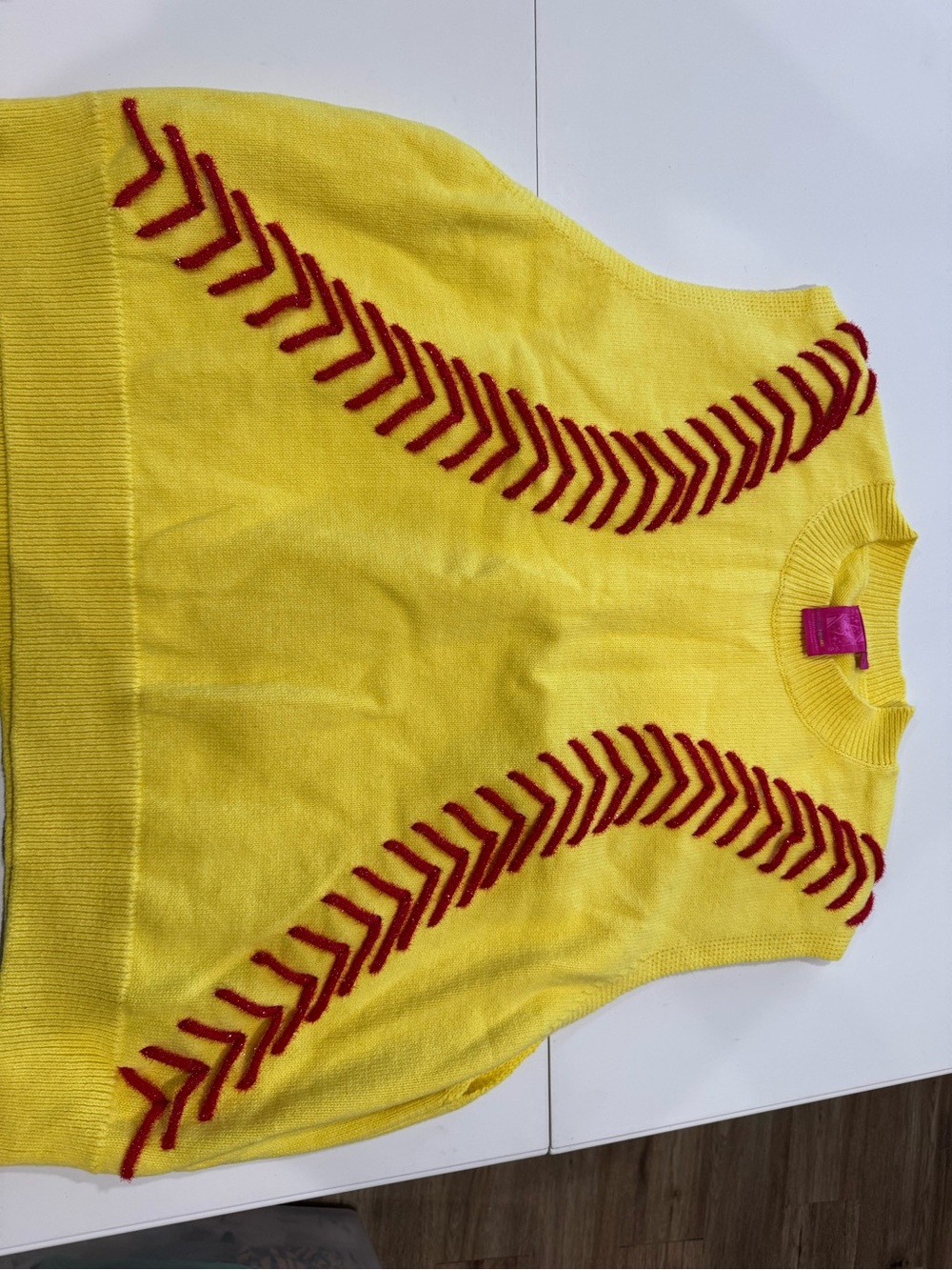 QUEEN OF SPARKLES Yellow Sleeveless Knit Top with Red Chevron Stitching